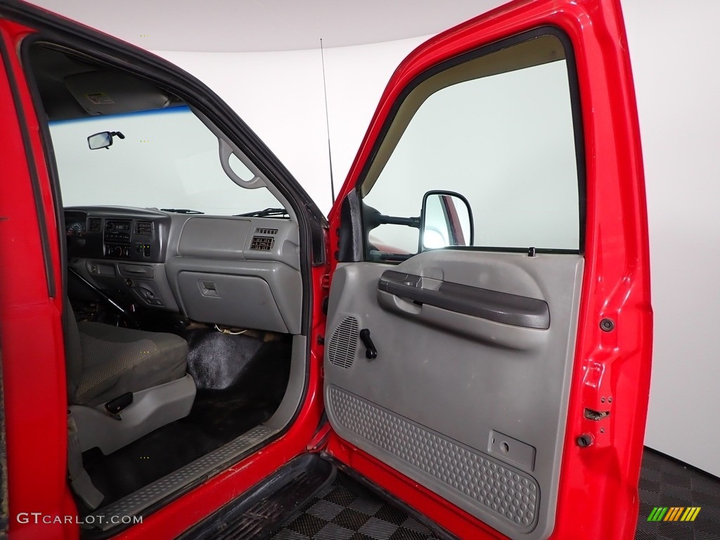 2002 F450 Super Duty Regular Cab 4x4 Stake Truck - Vermillion Red / Medium Graphite photo #12
