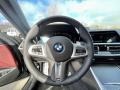 2023 BMW 4 Series Tacora Red Interior Steering Wheel Photo
