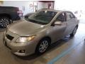 Desert Sand Metallic 2010 Toyota Corolla LE