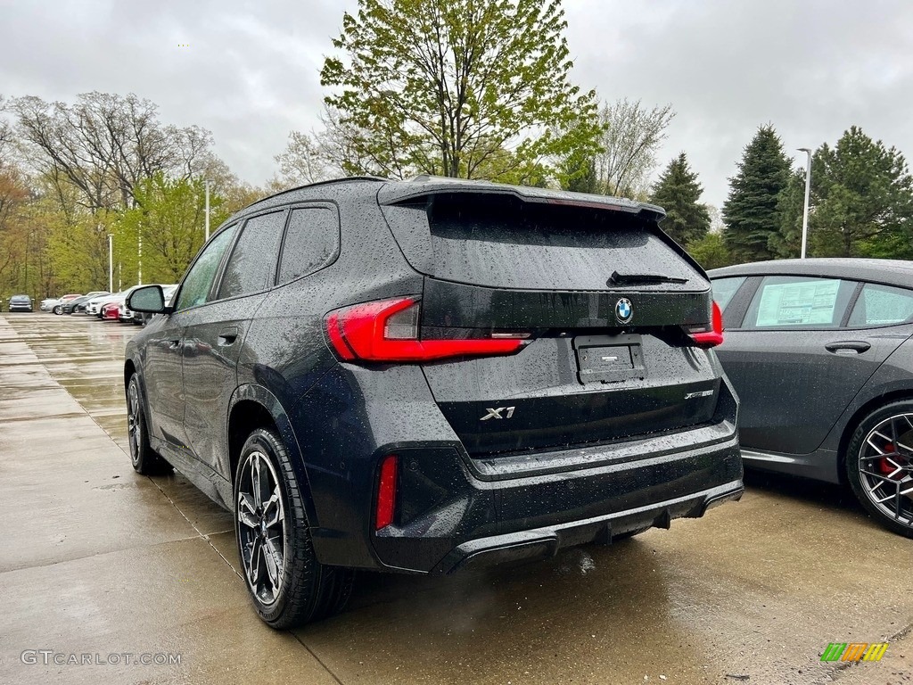 2023 X1 xDrive28i - Black Sapphire Metallic / Red/Black Bicolor photo #3