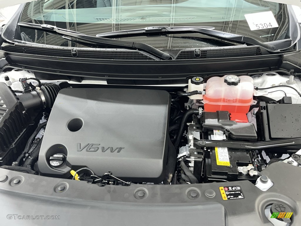 2023 Enclave Essence - Summit White / Dark Galvanized/Ebony photo #28