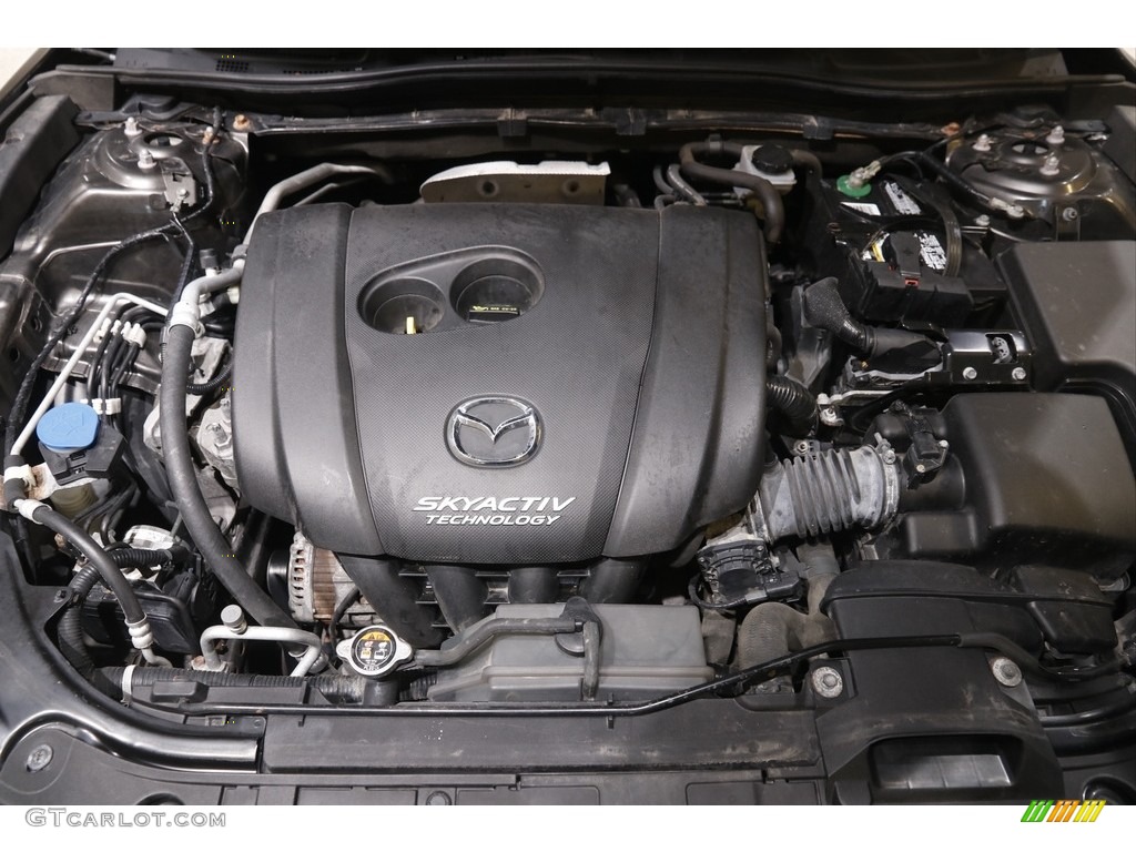 2015 MAZDA3 i SV 4 Door - Titanium Flash Mica / Black photo #15