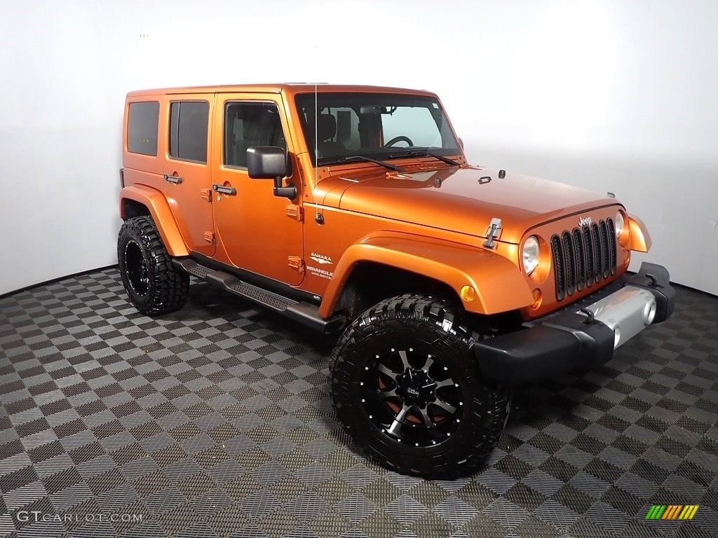 2011 Wrangler Unlimited Sahara 4x4 - Mango Tango Pearl / Black/Dark Saddle photo #3