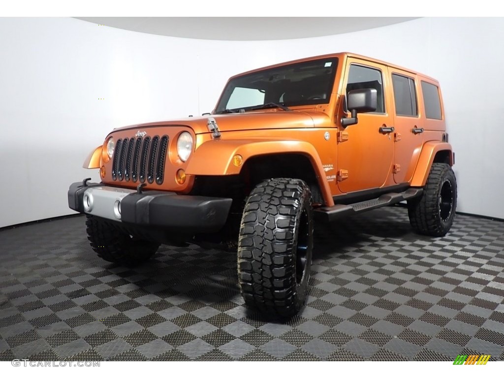 2011 Wrangler Unlimited Sahara 4x4 - Mango Tango Pearl / Black/Dark Saddle photo #8