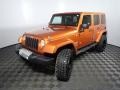 2011 Mango Tango Pearl Jeep Wrangler Unlimited Sahara 4x4  photo #9