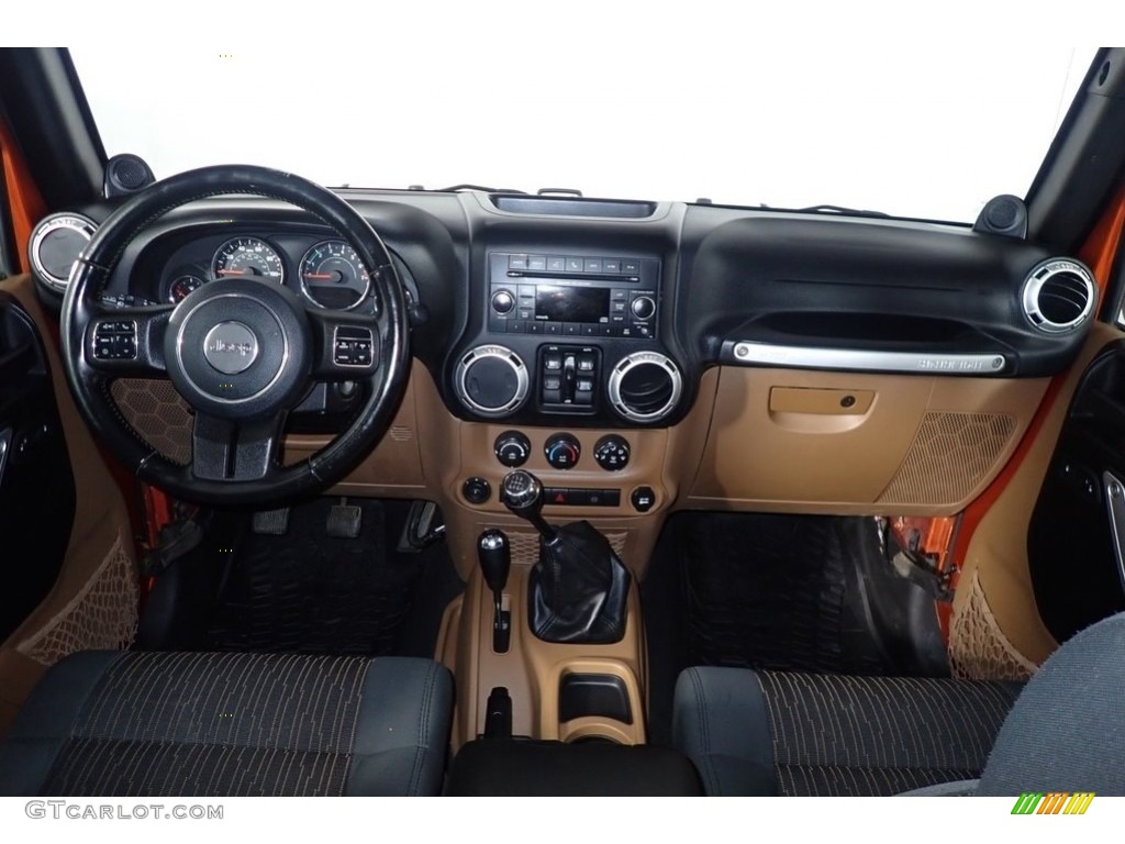 2011 Wrangler Unlimited Sahara 4x4 - Mango Tango Pearl / Black/Dark Saddle photo #16