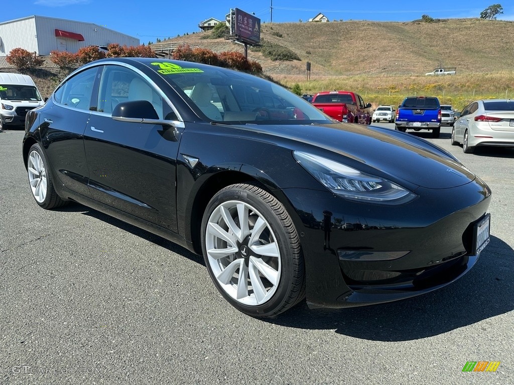 Solid Black 2020 Tesla Model 3 Standard Range Plus Exterior Photo #146117546