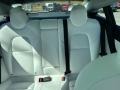 2020 Tesla Model 3 White/Black Interior Rear Seat Photo