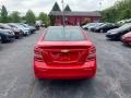 Red Hot - Sonic Premier Sedan Photo No. 4