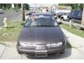 1999 Brown Saturn S Series SL2 Sedan  photo #2
