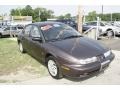 1999 Brown Saturn S Series SL2 Sedan  photo #3