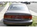 1999 Brown Saturn S Series SL2 Sedan  photo #6