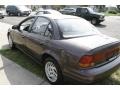 1999 Brown Saturn S Series SL2 Sedan  photo #8