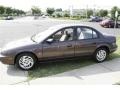 1999 Brown Saturn S Series SL2 Sedan  photo #9