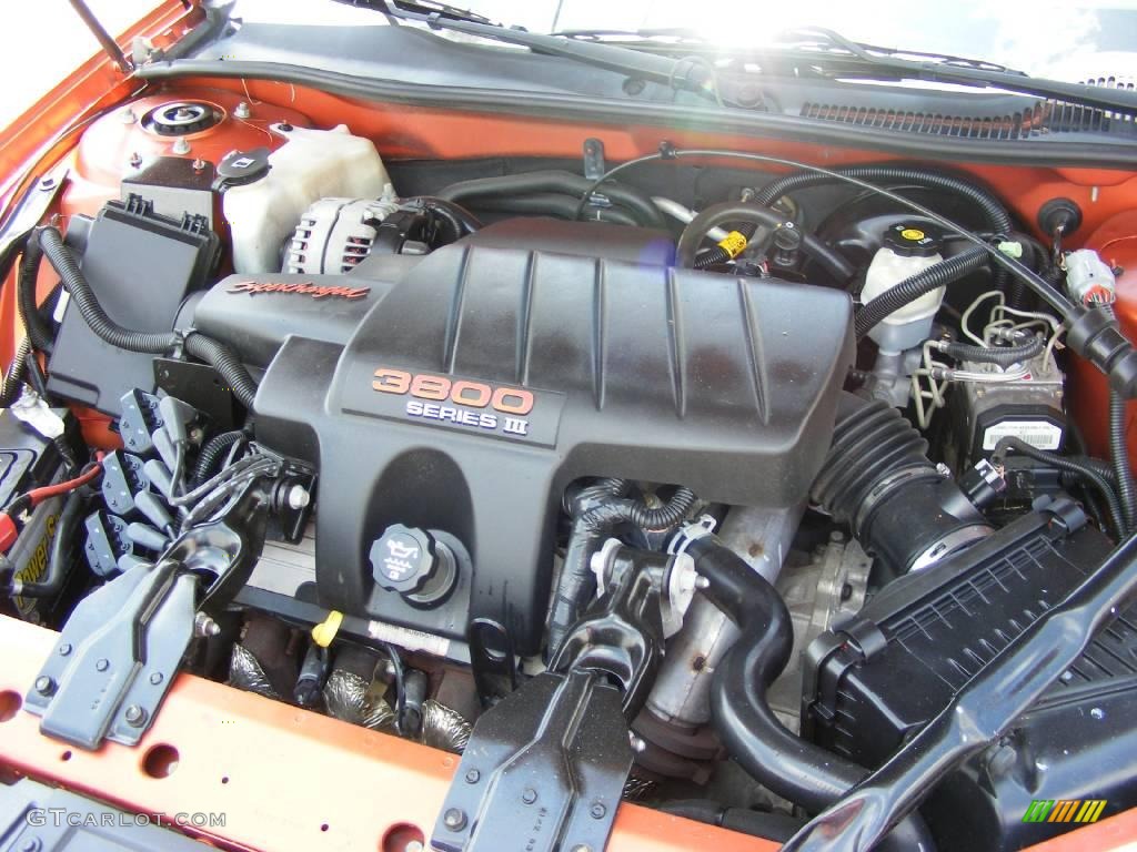 2004 Grand Prix GTP Sedan - Fusion Orange Metallic / Dark Pewter photo #11