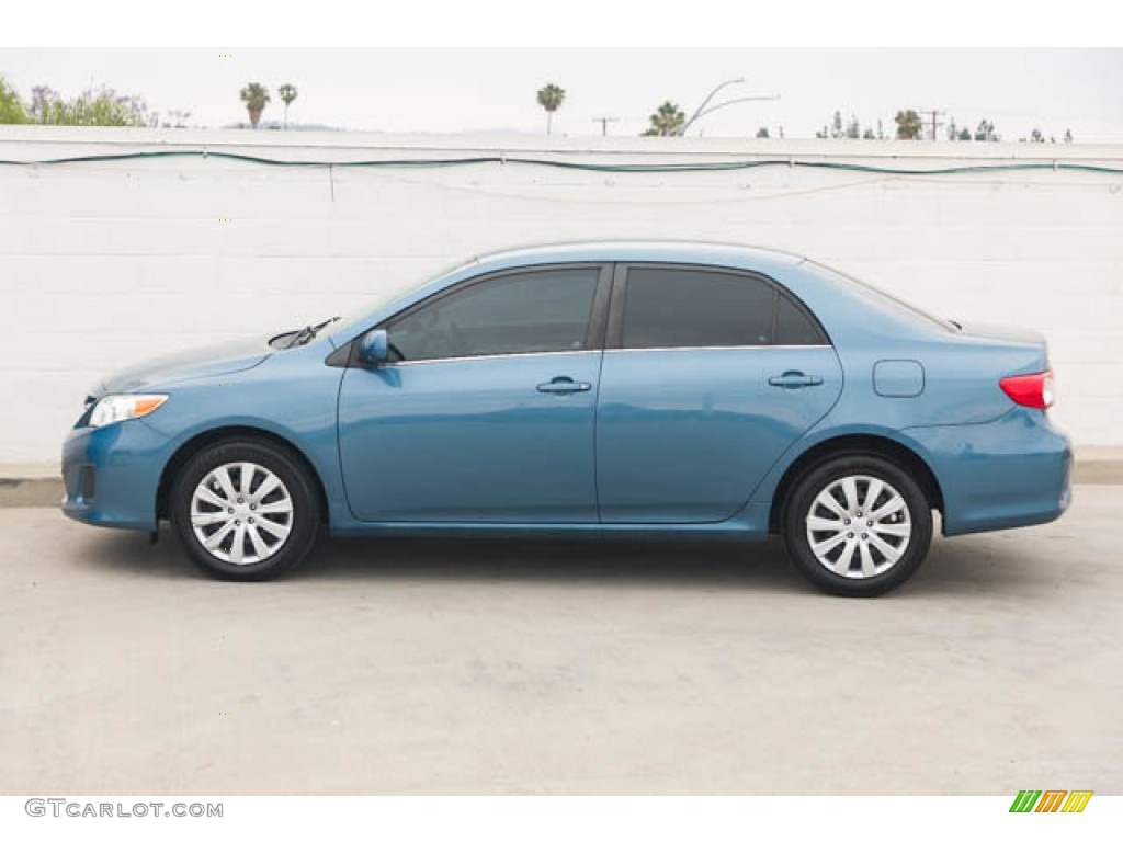 Tropical Sea Metallic 2013 Toyota Corolla LE Exterior Photo #146187693