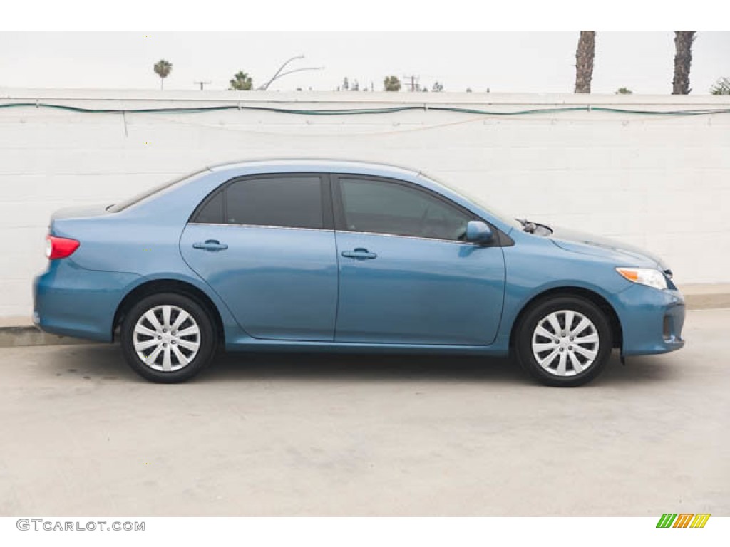 Tropical Sea Metallic 2013 Toyota Corolla LE Exterior Photo #146187777