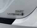 2023 Toyota Camry SE Hybrid Marks and Logos