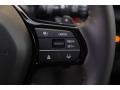 Black 2023 Honda CR-V Sport Touring AWD Hybrid Steering Wheel