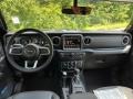 Black 2023 Jeep Wrangler Unlimited Sahara 4XE Hybrid Dashboard