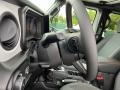 Black 2024 Jeep Wrangler 4-Door Sport S 4x4 Steering Wheel