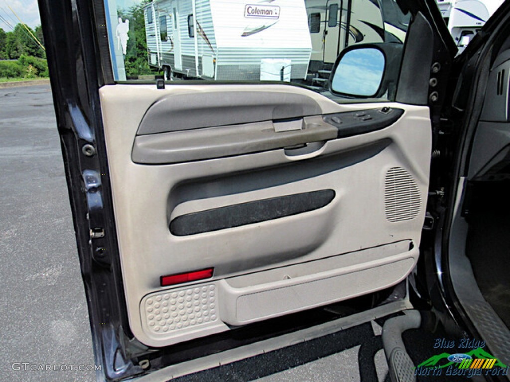 2000 Ford F250 Super Duty XLT Extended Cab Medium Graphite Door Panel Photo #146311706