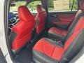 2023 Toyota Highlander Cockpit Red Interior Rear Seat Photo