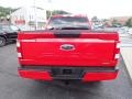 2023 Race Red Ford F150 XLT SuperCab 4x4  photo #4