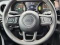 Black 2024 Jeep Wrangler 4-Door Willys 4xe Hybrid Steering Wheel