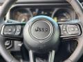 Black 2024 Jeep Wrangler 4-Door Willys 4xe Hybrid Steering Wheel
