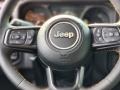Black 2024 Jeep Wrangler 4-Door Willys 4xe Hybrid Steering Wheel