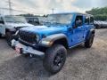 Hydro Blue Pearl 2024 Jeep Wrangler 4-Door Willys 4xe Hybrid
