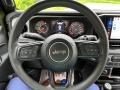 Black 2024 Jeep Wrangler 4-Door Sport 4x4 Steering Wheel