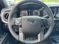 Black/Cement 2023 Toyota Tacoma TRD Off Road Double Cab 4x4 Steering Wheel