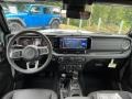 Black 2024 Jeep Wrangler 4-Door Sahara 4x4 Dashboard