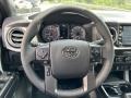 Black/Cement 2023 Toyota Tacoma TRD Off Road Double Cab 4x4 Steering Wheel