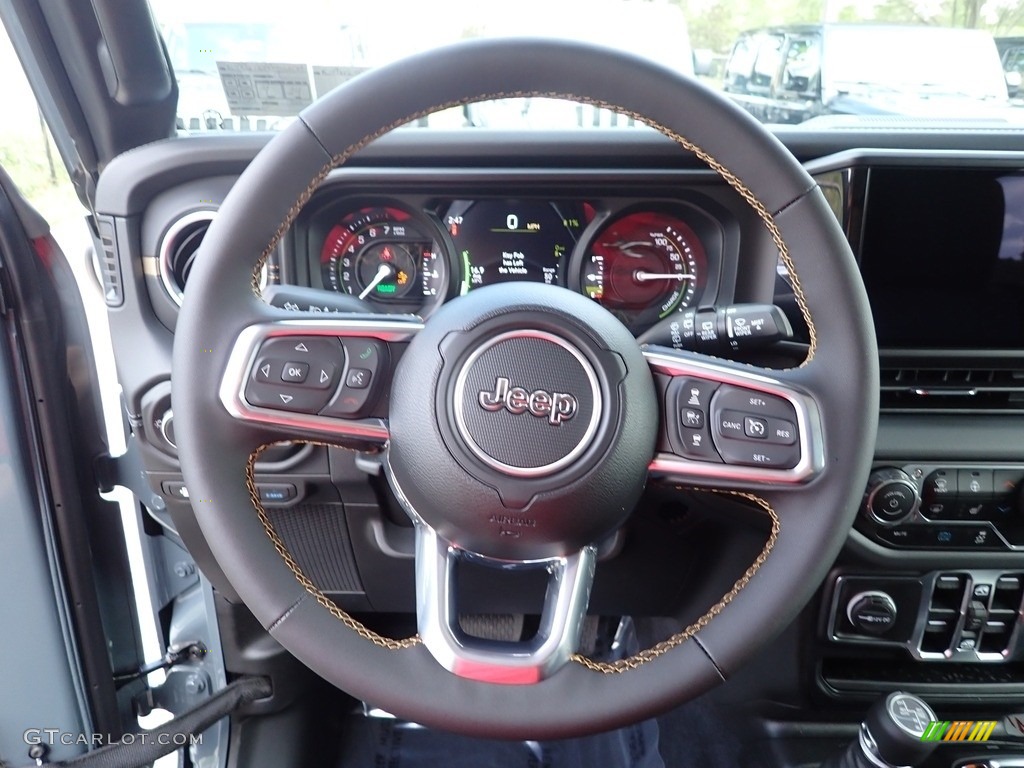 2024 Jeep Wrangler 4-Door Sahara 4xe Hybrid Steering Wheel Photos