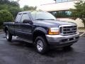 2001 True Blue Metallic Ford F250 Super Duty XLT SuperCab 4x4  photo #17