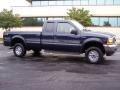 2001 True Blue Metallic Ford F250 Super Duty XLT SuperCab 4x4  photo #19