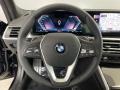 Black 2024 BMW 3 Series 330i Sedan Steering Wheel
