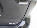 2023 Toyota Highlander Hybrid XLE Bronze Edition AWD Badge and Logo Photo