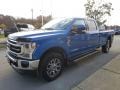 Front 3/4 View of 2021 F350 Super Duty Lariat Crew Cab 4x4