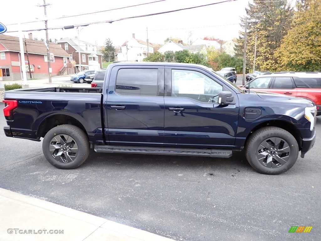 Antimatter Blue Metallic 2023 Ford F150 Lightning XLT 4x4 Exterior Photo #146749244