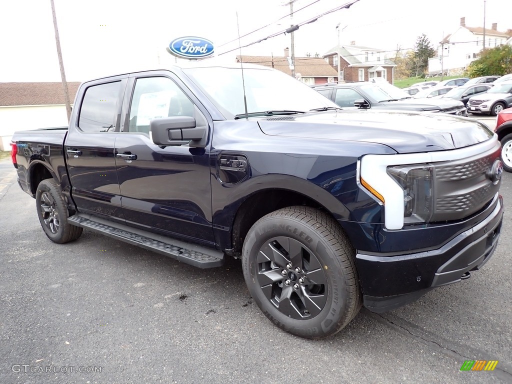Antimatter Blue Metallic 2023 Ford F150 Lightning XLT 4x4 Exterior Photo #146749265