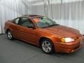 2003 Fusion Orange Metallic Pontiac Grand Am GT Coupe  photo #1