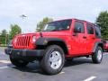 2009 Flame Red Jeep Wrangler Unlimited X  photo #1