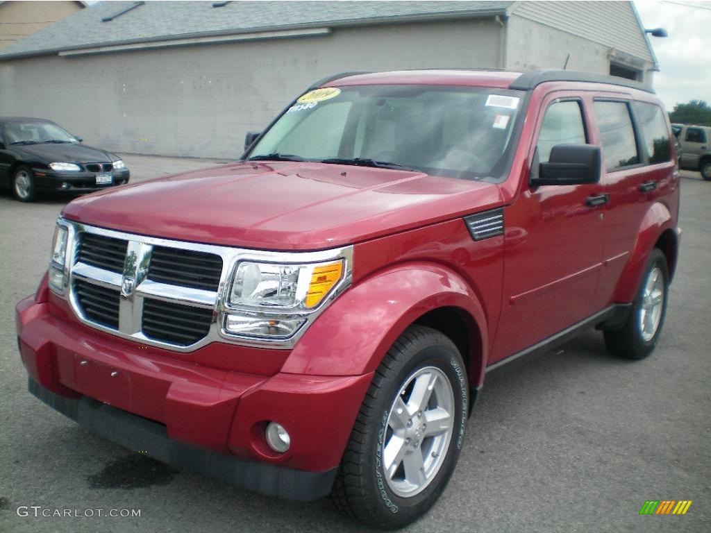 2009 Nitro SE 4x4 - Inferno Red Crystal Pearl / Dark Slate Gray photo #1