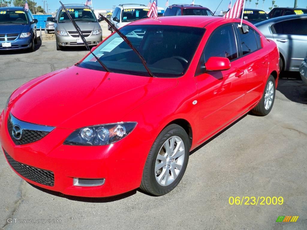 2007 MAZDA3 i Sport Sedan - True Red / Black photo #1