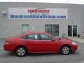 2009 Victory Red Chevrolet Impala LT  photo #1