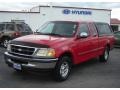 1997 Bright Red Ford F150 XLT Extended Cab  photo #1